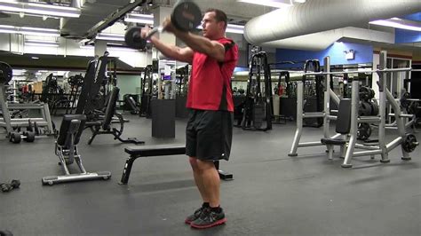 Standing Straight Bar Front Raise .